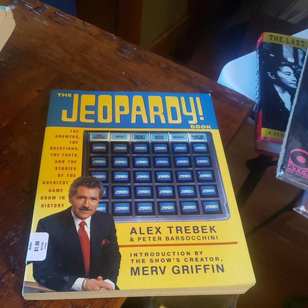 The Jeopardy Book by Alex Trebek 1990 FIRST EDITION paperback Intro Merv Griffin
